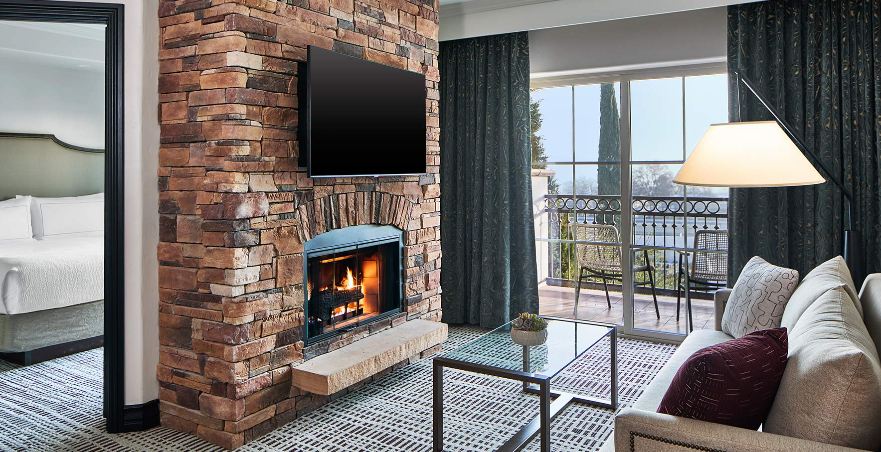 King Suite with Kitchen, Fireplace, and Balcony King Suite with Kitchen, Fireplace, and Balcony